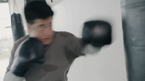 man boxing training session