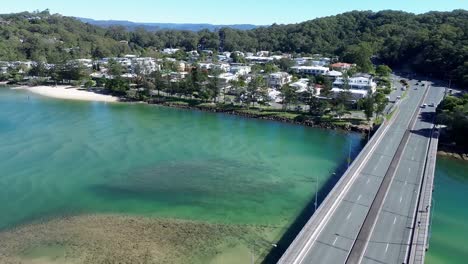 stunning drone video of tallebudgera river in gold coast, australia. turquoise water, little gold beach and slow pace life for this small suburb
