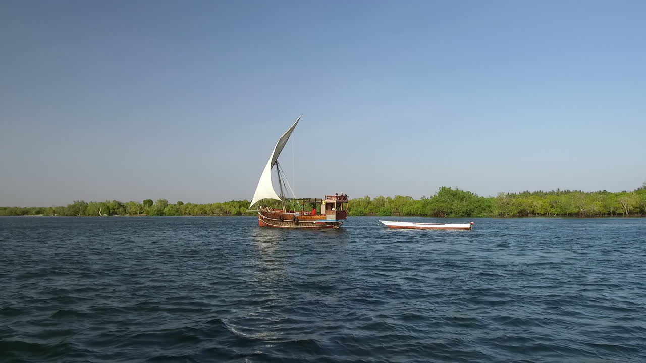 A Swahili dhow boat sails on Mida Creek in Watamu, Kenya.