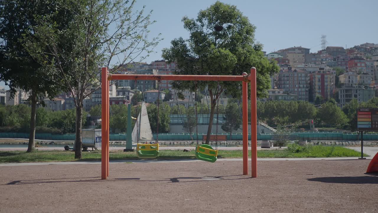 Empty Swing Set in a City Park