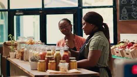 vendor giving fresh homemade sauces to customer