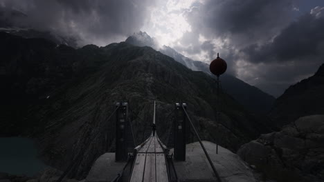 hiking suspension bridge in the alps