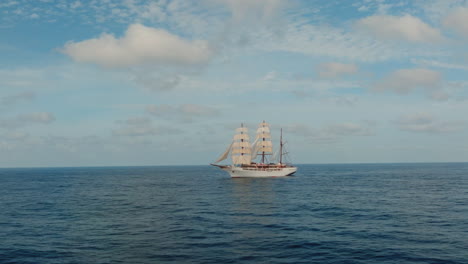Sea cloud luxury cruise ship sailing vessel in the Atlantic Ocean under clear daylight, Drone view