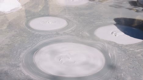 boiling mud pool in geothermal region, beppu jigoku in oita japan