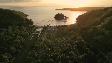 bird-eye-view-of-Crystal-bay-beach-at-a-golden-sunset---Nusa-Penida,-Indonesia