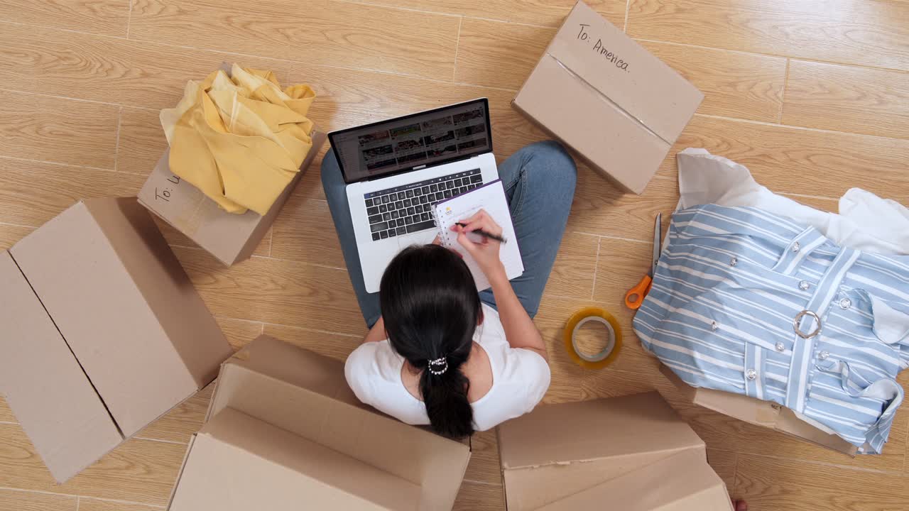 Asian Women  Taking Note Of Customers Ordering To Prepare