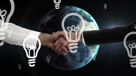 animation of light bulbs and globe spinning over business people shaking hands