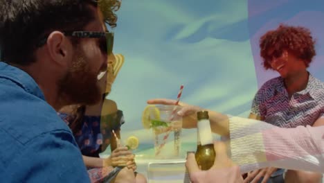 animación de ondear la bandera de francia sobre un grupo de amigos divirtiéndose en la playa