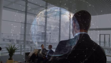 animation of globe with data processing over diverse business people