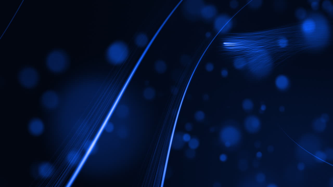 검은 바탕에 구부러진 빛의 빛나는 파란색  ⁇ 과 불분명한 파란색 반점이 있습니다.