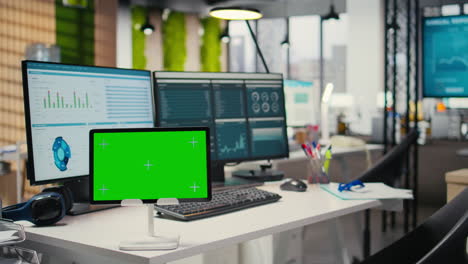 vertical video empty high end workstation with computers and mockup on tablet
