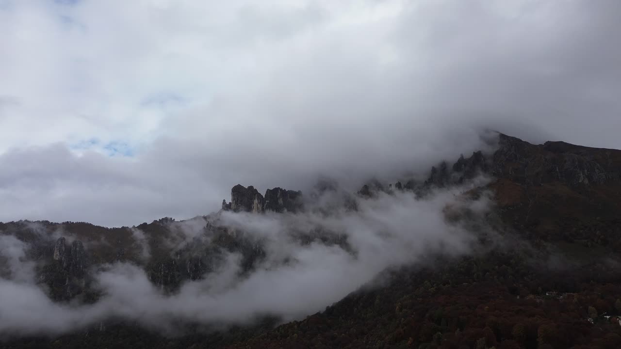 White clouds covering a mountain are nature's embrace and admiring them brings with it nostalgia and a cold ambiance that provokes feelings of love