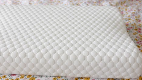 white quilted memory foam pillow