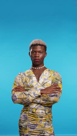 transgender man looking at camera with a serious face.