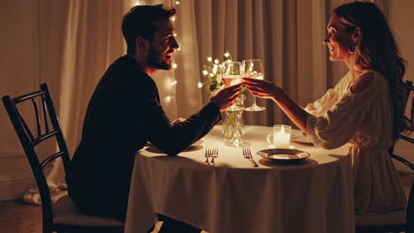 romantic couple celebrating dinner