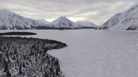 winter scene of kathleen lake within kluane national park and reserve in yukon, canada. aerial drone shot