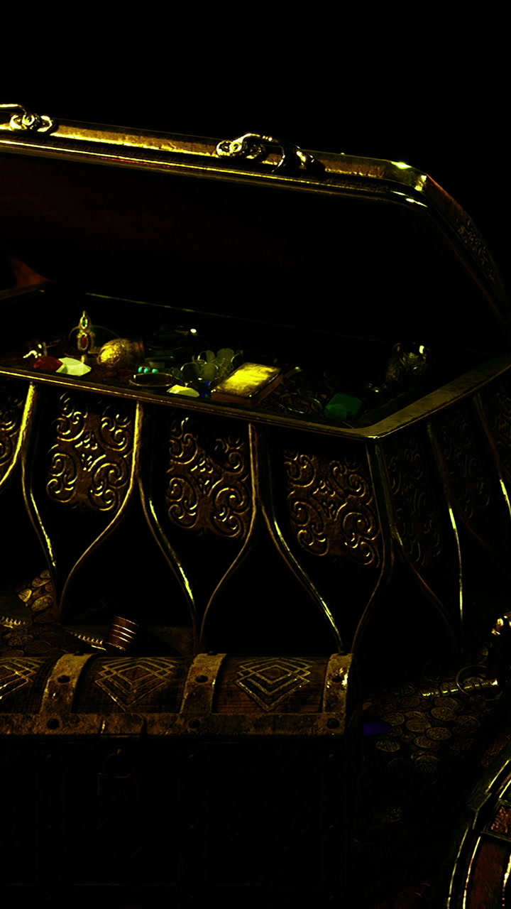 Treasure chest filled with colorful items in dim light setting