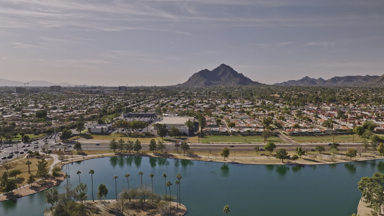 Scottsdale Arizona Aerial v5 drone flyover Chaparral Lake and Villa Monterey neighborhood towards Camelback mountain capturing cityscape with desert views - Shot with Mavic 3 Cine - February 2022