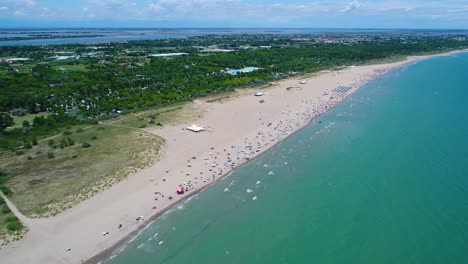 italy, the beach of the adriatic sea. rest on the sea near venice. aerial fpv drone flights.