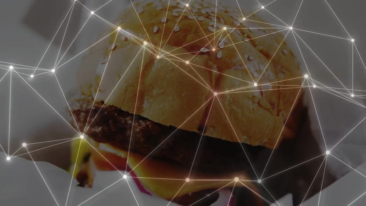 Camera pan nudging burger center, node overlay pulsing over bun, revealing cheese for food design