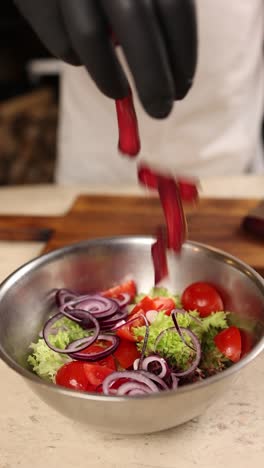 chef preparing a vegetable salad