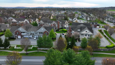 Red-pick-up-truck-drives-through-residential-community