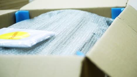 packed furniture or product in a cardboard box