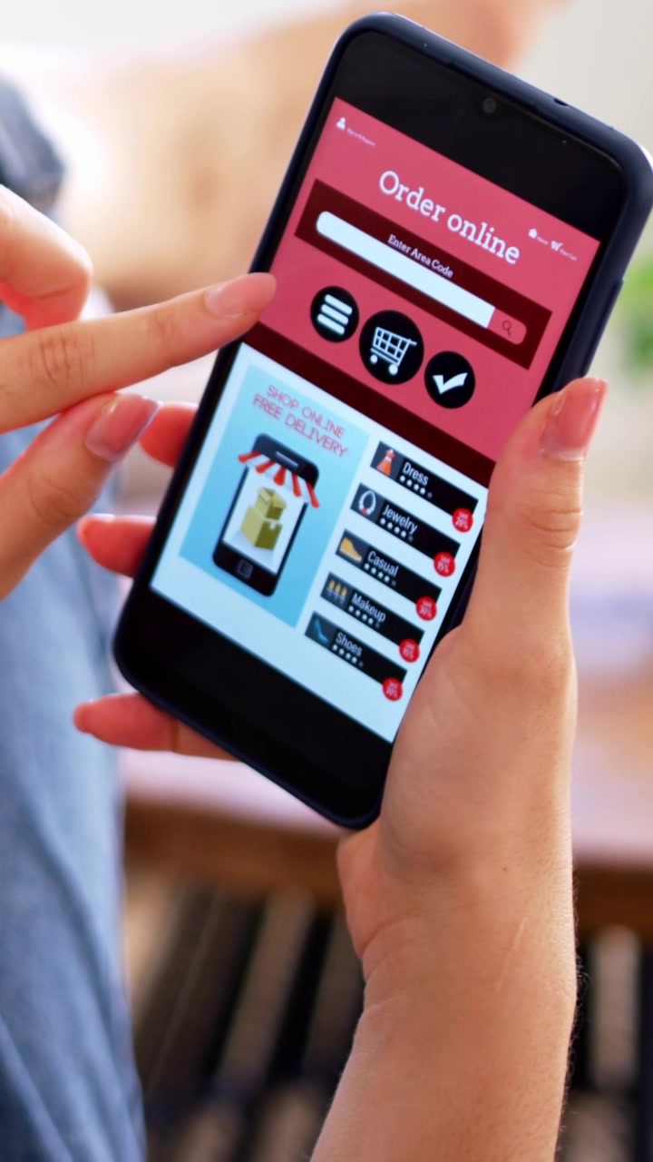 Vertical video: Tapping African woman with phone navigating shop app at home, following red badges