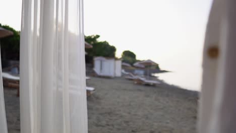 woman-walking-in-seaside-place-in-morning