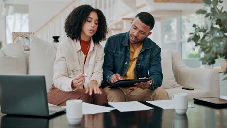 couple discussing finances at home