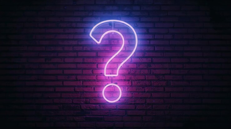 Neon question mark sign powering up in alley red-lit brick wall, pulsing color shift