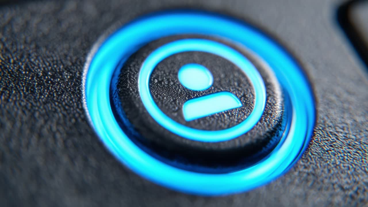 Close-Up of a Textured Button Featuring a User Icon, Highlighting Intricate Details and Dual Color Design in a Modern Device Setting