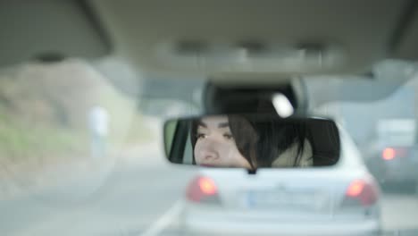 confident businesswoman driving her car, dressed in elegant business attire, showcasing independence and professionalism in a modern vehicle interior