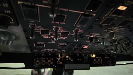 Engine-start-inside-a-modern-jet-cockpit-during-a-nocturnal-flight