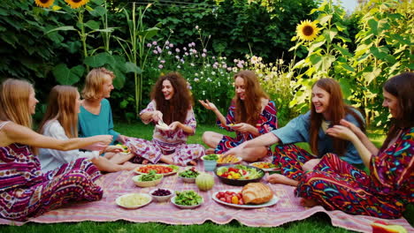 friends enjoying a colorful picnic in a garden