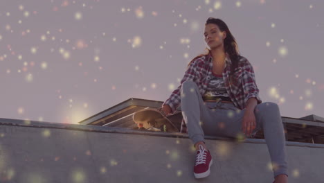 woman sitting on concrete skate ramp at dusk, holding skateboard, showing glowing marketing charts