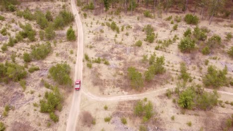 off-road vehicle travels down the rough road in leota, michigan