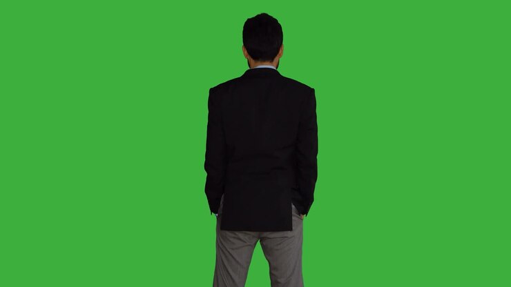 Young Asian Man Isolated on Green Screen Background. Portrait of Businessman Representing Business Strategy Ideas. Professional Lifestyle Shot.