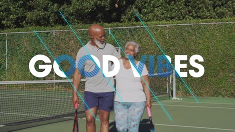 animation of good vibes text over smiling senior african american couple playing tennis