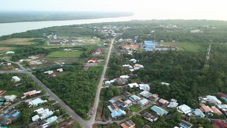 aerial drone view during summer kabong fishing village,with river and beach,sarawak,borneo
