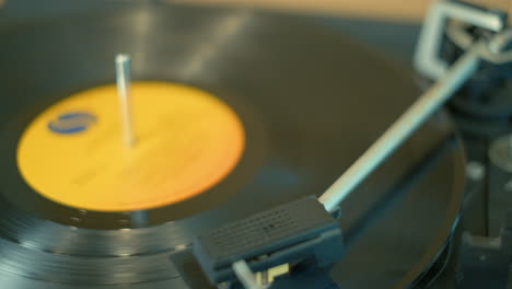 lp record spinning slowly on retro turntable