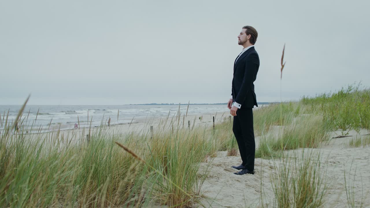 Man in Suit on the Beach