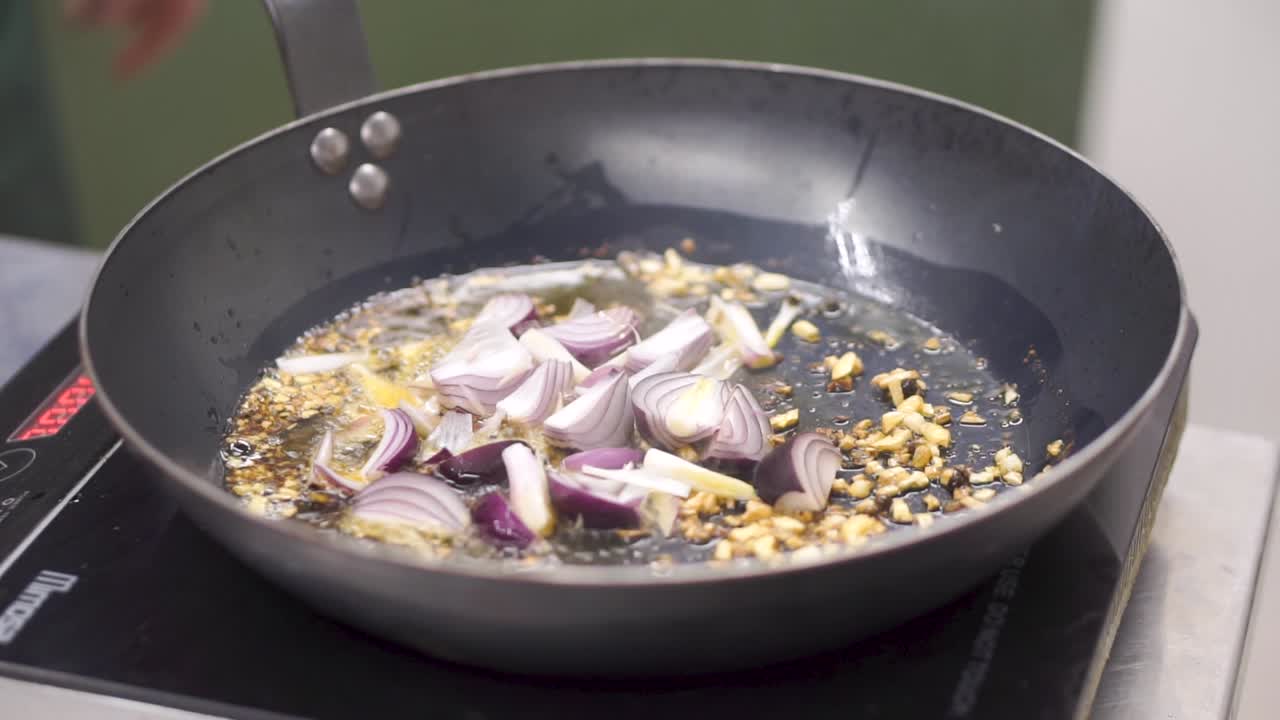 Cooking Onions and Garlic in a Pan