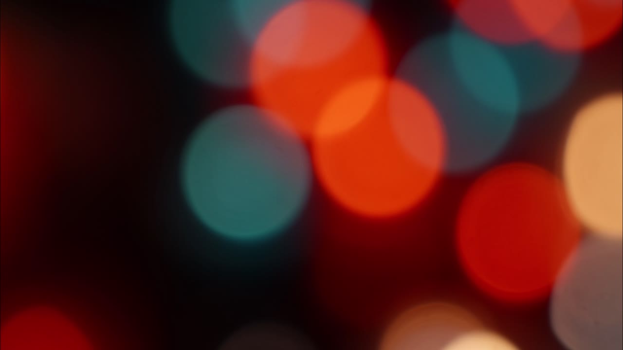 Dynamic Bokeh Light Background with Red and Blue Hues