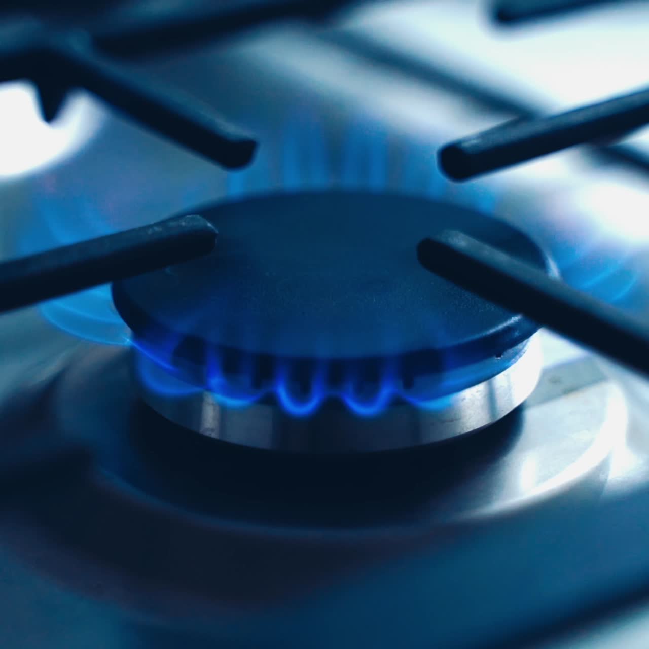 Burning blue flame of gas