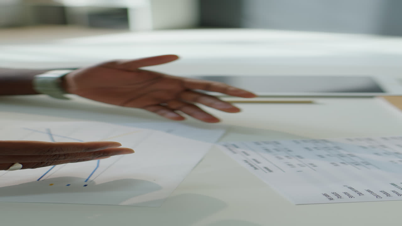 Close Up of Multiethnic Colleagues Shaking Hands