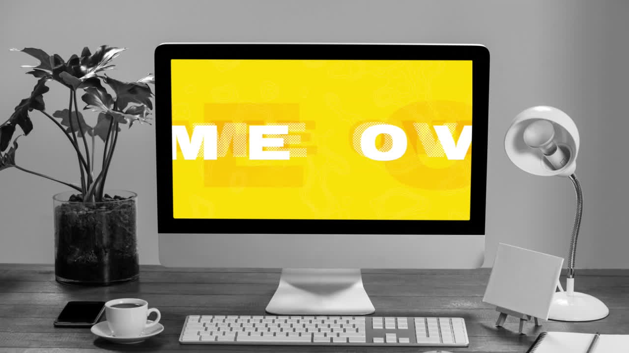 animación de varios juegos sobre texto blanco sobre la pantalla de la computadora en el escritorio sobre fondo gris