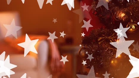 animación de estrellas de navidad cayendo sobre un fondo borroso