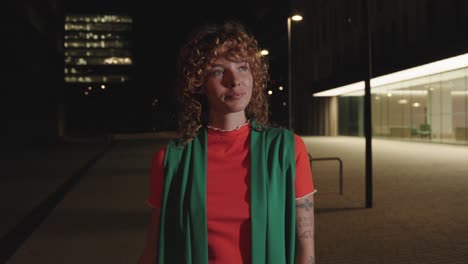 woman in city at night