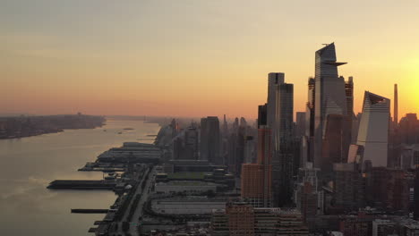 a high angle view of manhattan's westside at sunrise on a hazy morning